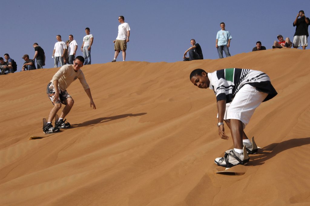 sandboarding in desert