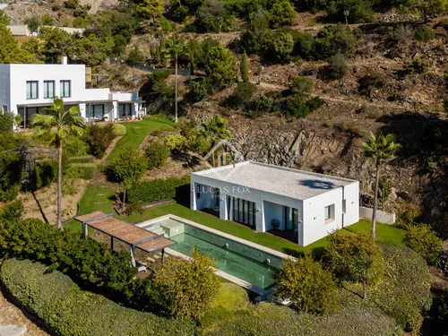Modern Mediterranean villa in El Madroñal, a contemporary hillside retreat with breathtaking mountain and sea views